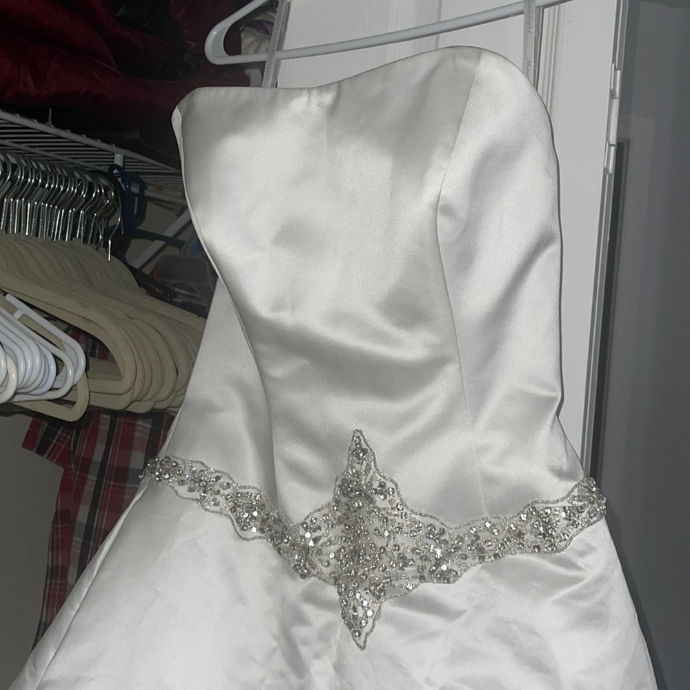 Size 14. White wedding dress w stone accent & small train. Never worn